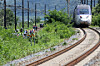 A Mugunghwa train bound for Masan travels at a slower pace than usual as Korail, police and fire authorities inspect a scene near Cheongdo, North Gyeongsang, after a train hit seven rail workers on Aug. 19. [NEWS1]