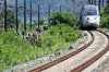 A Mugunghwa train bound for Masan travels at a slower pace than usual as Korail, police and fire authorities inspect a scene near Cheongdo, North Gyeongsang, after a train hit seven rail workers on Aug. 19. [NEWS1]