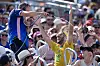 Volleyball equipment coordinator Stephane Brissac sprays water on fans during a heatwave in Paris on Tuesday. [AP/YONHAP]