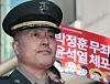 Col. Park Jung-hun, a former Marine Corps chief investigator, attends a press conference in Seoul held ahead of a court martial ruling on his insubordination charges on Jan. 9, 2024. [YONHAP]