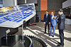 Hanwha Group Chairman Kim Seung-youn, center, and Vice Chairman Kim Dong-kwan, far left, inspect a full-scale model of a 15-centimeter-resolution (6-inch), ultra-high-resolution synthetic-aperture radar satellite in very low Earth orbit during their visit to Hanwha Systems’ Hanwha Space Center on Jeju Island on Jan. 8. [HANWHA GROUP]