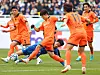 Gangwon FC, in orange, play against the Suwon Samsung Bluewings during a K League 1 match at Suwon World Cup Stadium in western Seoul on Dec. 2, 2023. [YONHAP]