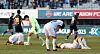 Busan IPark, in white, react during the K League promotion-relegation playoff against Suwon FC at Suwon Sports Complex in Suwon, Gyeonggi on Dec. 9, 2023. [NEWS1]
