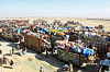 Afghan refugees along with their belongings on trucks await deportation to Afghanistan near the Pakistan-Afghanistan border in Chaman on Oct. 29. [AFP/YONHAP]