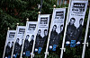 Banners are seen outside an Oasis merchandise store ahead of their concerts in Heaton Park in Manchester, Britain, July 9. [REUTERS/YONHAP]