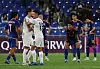 Ulsan HD, in blue, react after losing an 2024-25 AFC Champions League Elite match against Kawasaki Frontale at Munsu Football Stadium in Ulsan on Sept. 18. [YONHAP]