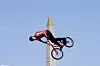 Marin Rantes of Croatia performs a trick, with the Luxor Obelisk of La Concorde square in the background, during the cycling BMX freestyle men's park qualification at the Paris Olympics on Tuesday in Paris. [AP/YONHAP]