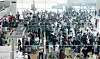 Terminal 1 of Incheon International Airport is seen crowded with travelers on Aug. 8. [JOINT PRESS CORPS]