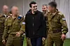American-Israeli Edan Alexander, 21, is accompanied by members of the IDF before being reunited with his family after being held captive by Hamas in Gaza since October 7, 2023. Alexander was released on May 12, following successful negotiations between the United States and the terrorist organization. [UPI/YONHAP]