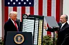 U.S. President Donald Trump holds a chart next to U.S. Secretary of Commerce Howard Lutnick as Trump delivers remarks on tariffs in the Rose Garden at the White House in Washington on April 2. [REUTERS/YONHAP]