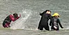 Citizens enjoy a water fight at the Gwangalli Beach in Busan on June 27. [YONHAP]
