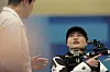Korea's Keum Ji-hyeon is instructed by her coach as she competes for the gold medal in the 10-meter air rifle mixed team gold medal round at the 2024 Paris Olympics on Saturday in Chateauroux, France. [AP/YONHAP]