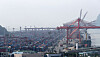 Containers are stacked at a port in the southeastern city of Busan on Monday. [NEWS1]