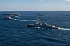 Warships from the South Korean, U.S. and Japanese navies carry out a joint exercise south of Jeju Island in this photo provided by the U.S. Navy on Wednesday. The nuclear-powered aircraft carrier USS Carl Vinson can be seen in the top left of the photo. [U.S. NAVY]