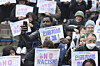Foreigners and Koreans call for an end to racism at a rally held in front of Seoul Station in central Seoul on March 16, the International Day for the Elimination of Racial Discrimination. [YONHAP]