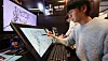 A visitor tries the webtoon illustration experience at the 2023 Webtoon Job Festa held at southern Seoul's Coex on Nov. 28, 2023. [NEWS1]