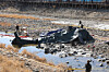 Military personnel examine the site of an AH-1S Cobra helicopter crash in Gapyeong, Gyeonggi, on Feb. 9. [YONHAP]