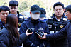 The first mate, accused of grounding a ferry off the coast of Shinan County, South Jeolla on Nov. 19 appears for questioning at the Gwangju District Court's Mokpo branch on Nov. 22. [YONHAP]