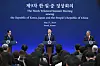 President Yoon Suk Yeol, center, speaks during a joint press briefing after holding a trilateral summit with Japanese Prime Minister Fumio Kishida, left, and Chinese Primer Li Qiang, right, at the Blue House in central Seoul on Monday. [JOINT PRESS CORPS]