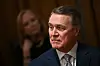 David Perdue, nominee for U.S. Ambassador to China, looks on as US President Donald Trump meets with U.S. ambassadors in the Cabinet Room of the White House in Washington on March 25. [AFP/YONHAP]