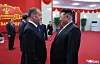 The North's leader Kim Jong-un, right, speaks with Dmitry Medvedev, deputy chairman of the Russian Security Council, at a stadium in Pyongyang, where celebrations for the 80th anniversary of the founding of the ruling Workers' Party of Korea were being held, on Oct. 9. [KOREAN CENTRAL NEWS AGENCY]
