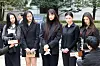 NewJeans members respond to questions from media at the Seoul Central District Court in Seocho District, southern Seoul, on March 7. [NEWS1]