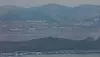 A hazy view of North Korea is seen from Odusan Observatory in Paju, Gyeonggi, on Feb. 10, marking 10 years since the suspension of operations at the Kaesong Industrial Complex. [NEWS1/YONHAP]