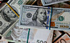 U.S. dollar, euro and Ukrainian hryvnia banknotes. [REUTERS/YONHAP]