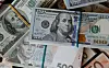 U.S. dollar, euro and Ukrainian hryvnia banknotes. [REUTERS/YONHAP]