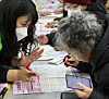 A person takes part in a job fair for older adults held in Busan on Dec. 8. [YONHAP]