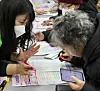 A person takes part in a job fair for older adults held in Busan on Dec. 8. [YONHAP]