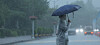 A sudden downpour hits the Jeju National University campus in Jeju July 18. [YONHAP]