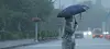 A sudden downpour hits the Jeju National University campus in Jeju July 18. [YONHAP]