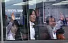 North Korean athletes competing in the 2024 Paris Olympics wave from a bus as they depart from Paris Charles de Gaulle Airport in France on Saturday. [NEWS1]