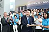 President Yoon Suk Yeol, center, visits Hyundai Motor Group Innovation Center in the Jurong Innovation District in Singapore on Wednesday, accompanied by Hyundai Motor Group Executive Chair Euisun Chung, left. Yoon is receiving an Ioniq model car as a souvenir. [JOINT PRESS CORPS]