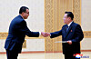 This Korean Central News Agency image on Sept. 26, 2025, shows North Korea's parliamentary chief Choe Ryong-hae, right, receiving a letter of credence from a new ambassador the previous day. [YONHAP]