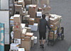 A delivery worker works at a distribution center in Seoul on Tuesday. [NEWS1]