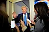 U.S. President Donald Trump talks to members of the press aboard Air Force One during a flight to Joint Base Andrews, Maryland on April 6. [REUTERS/YONHAP]