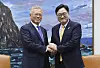 Former President Moon Jae-in, left, shakes hands with National Assembly Speaker Woo Won-shik, right, during a meeting before a ceremony marking the seventh anniversary of the April 27 Panmunjom Declaration at the National Assembly in Yeouido, western Seoul, on April 25. [JOINTS PRESS CORPS]