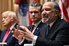 U.S. Secretary of Commerce Howard Lutnick, far right, speaks alongside U.S. Secretary of Defense Pete Hegseth, center, and U.S. President Donald Trump, left, during a cabinet meeting in the Cabinet Room of the White House in Washington on Dec. 2. [AFP/YONHAP]