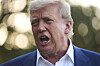 President Donald Trump speaks with reporters before boarding Marine One on the South Lawn of the White House on June 24 in Washington. [AP/YONHAP]