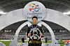 Former Ulsan Hyundai manager Kim Do-hoon poses with the AFC Champions League trophy after beating Persepolis in the final on Dec. 19, 2020. [AFC]