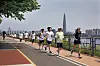 Participants of the Seoul city government's triathlon event run alongside the Han River in eastern Seoul on May 30. [PARK SANG-MOON]