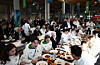 Italian President Sergio Mattarella eats with Italian athletes during a visit to the Olympic Village at the 2026 Milan-Cortina Winter Olympics in Milan on Feb. 5. [AP/YONHAP]
