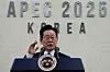 President Lee Jae Myung, center, takes a question during a press conference about the results of the two-day APEC summit at the International Media Center in Gyeongju, North Gyeongsang, on Nov. 1. [AP/YONHAP]