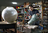 Sohn Dae-hyun, the artisan who practices the technique of making najeon chilgi (lacquerware inlaid with mother-of-pearl) adds the final touches to his creation at Sugok Workshop located in Gwangju, Gyeonggi. [PARK SANG-MOON]