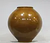 Geonchil Moon Jar created by Sohn Dae-hyun using the technique of geonchil, a dry lacquer technique that uses lacquered hemp cloth. [PARK SANG-MOON]