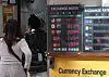 People line up at a currency exchange store in Myeongdong, central Seoul, on Nov. 14. [YONHAP]