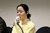 ADOR CEO Min Hee-jin smiles during Friday's press conference. [JOINT PRESS CORPS]