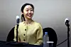 ADOR CEO Min Hee-jin smiles during Friday's press conference. [JOINT PRESS CORPS]